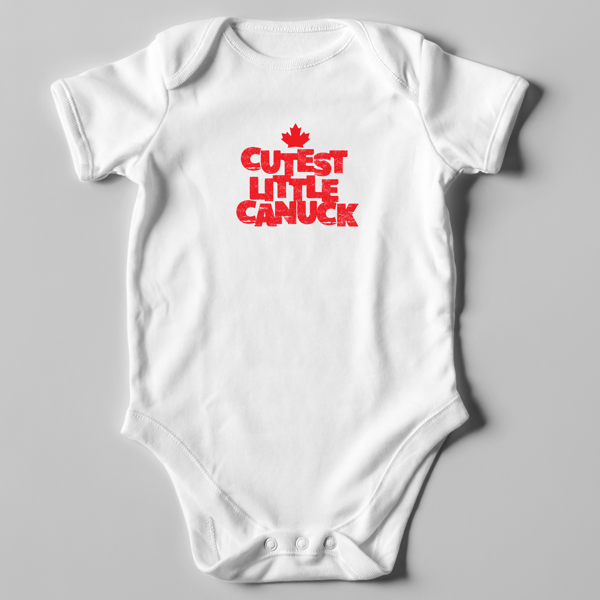 'Cutest Little Canuck' baby onesie in white