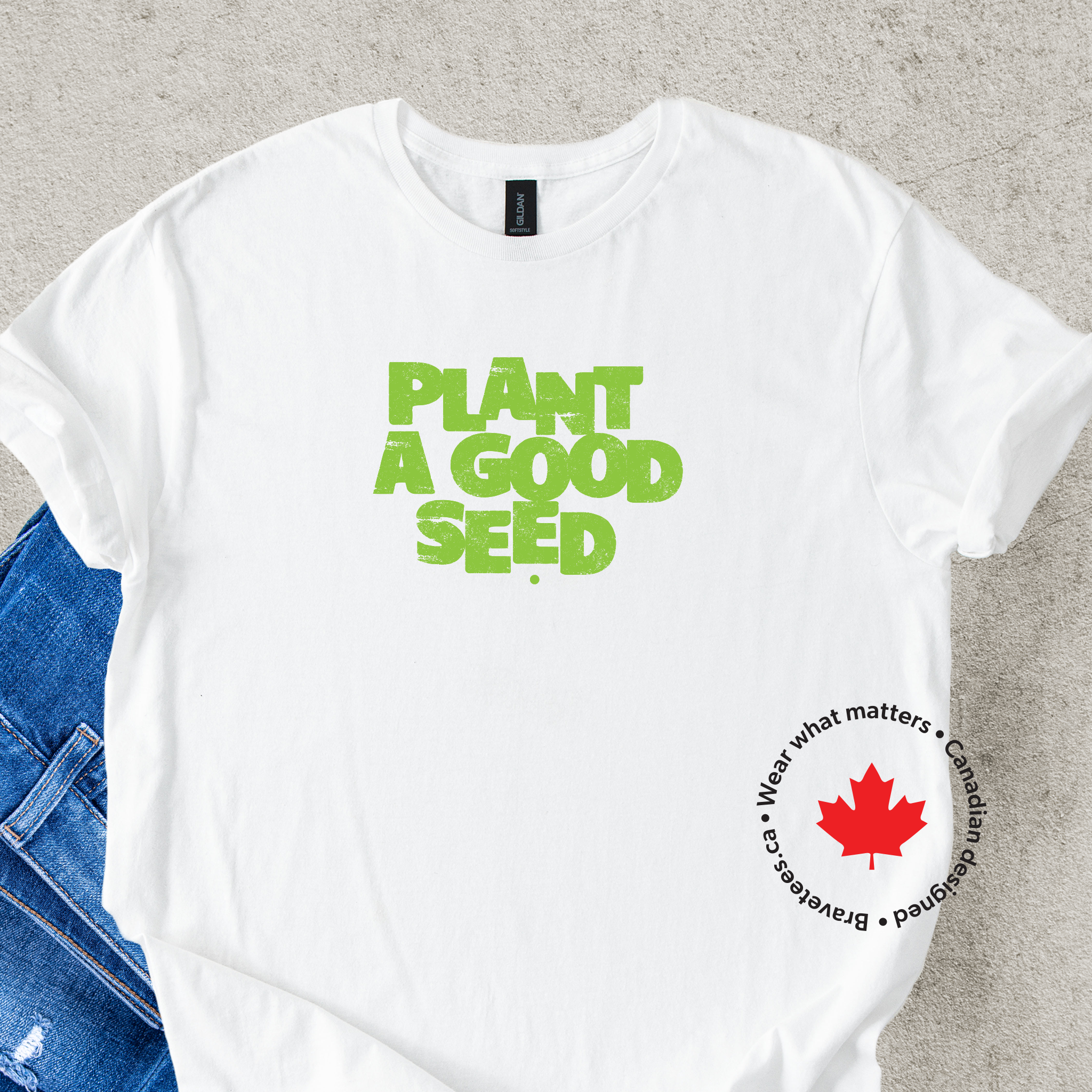 'Plant a Good Seed' green text on a white t-shirt