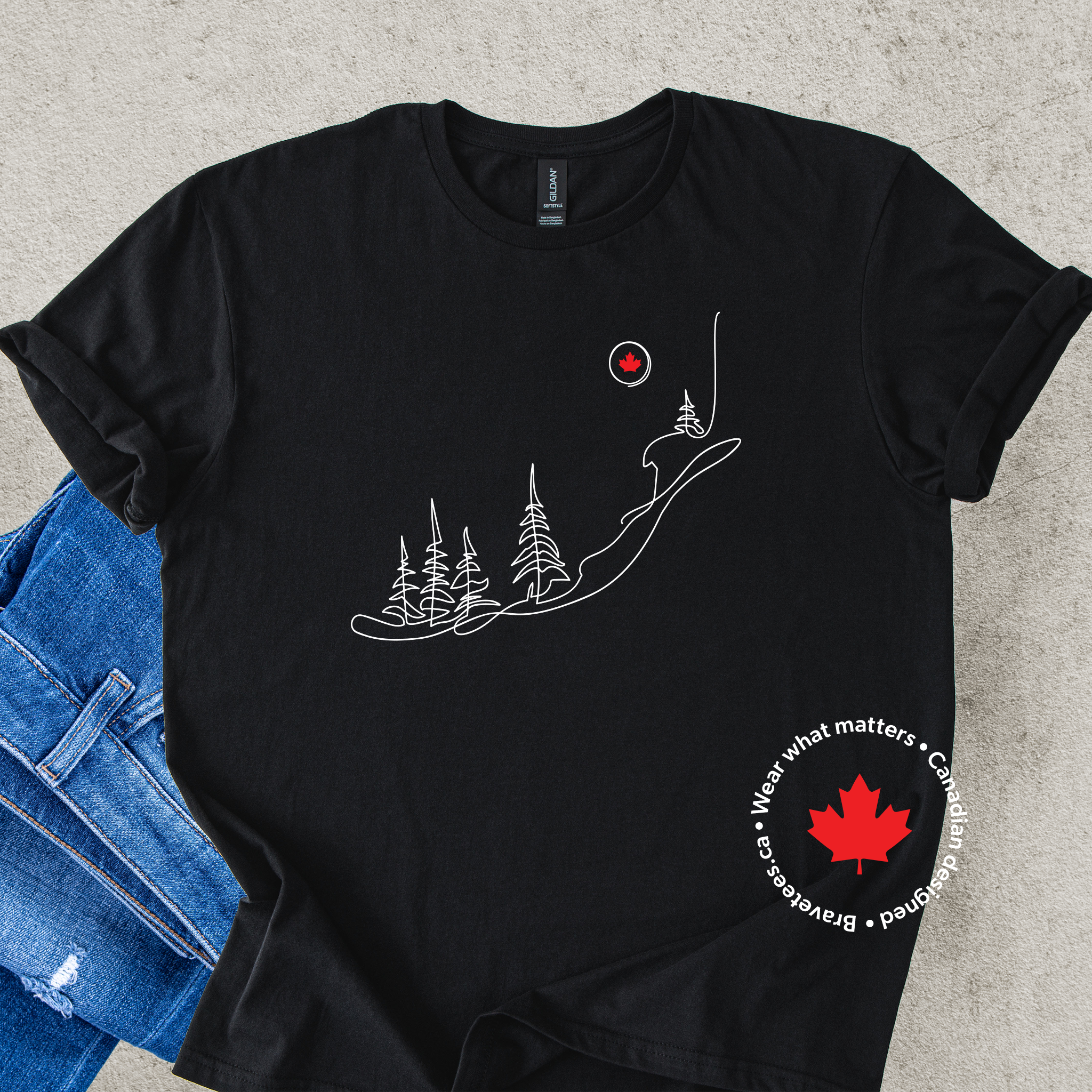 Black t-shirt with nature-themed design and Canadian maple leaf