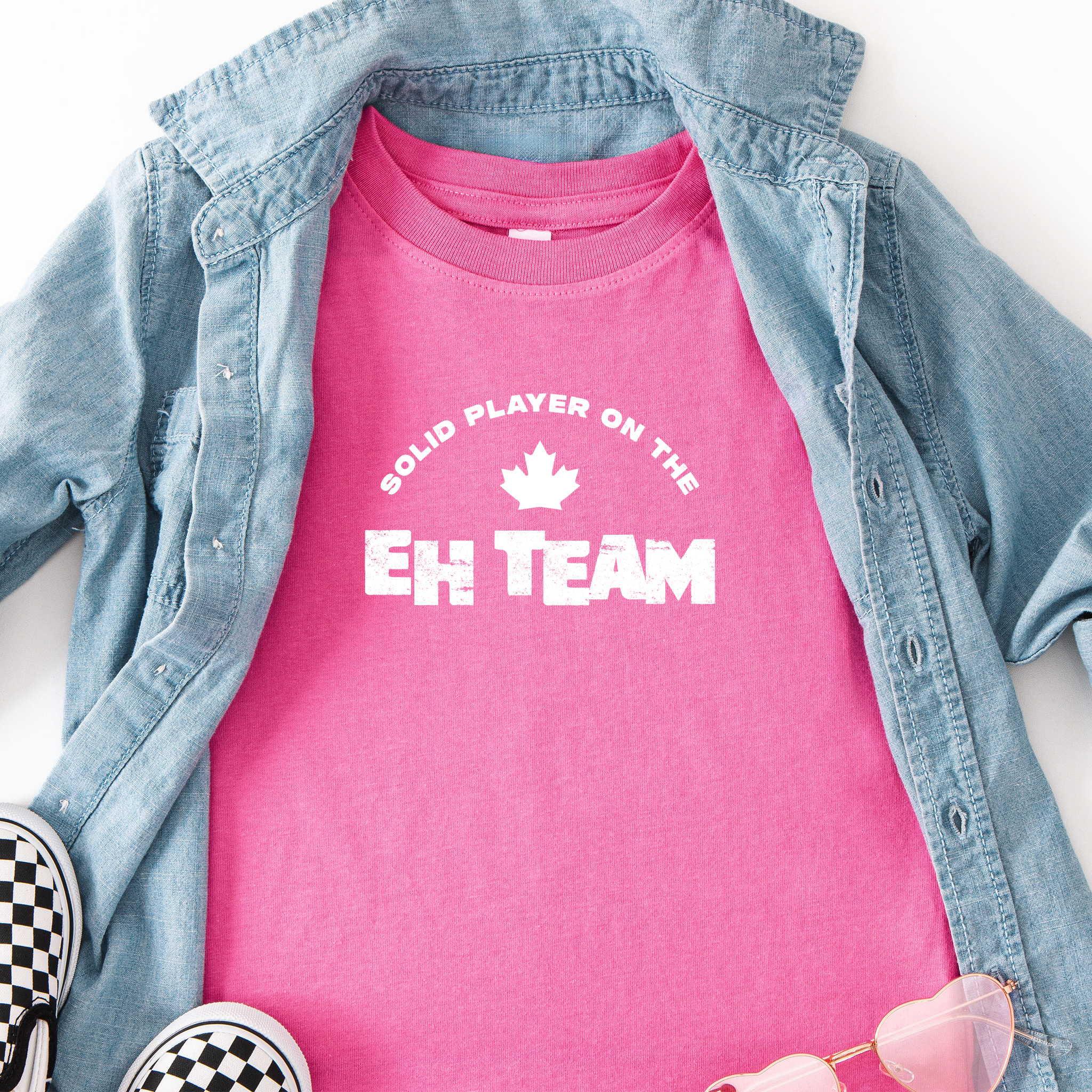 'Solid Player on the EH Team' text on a toddler t-shirt in pink