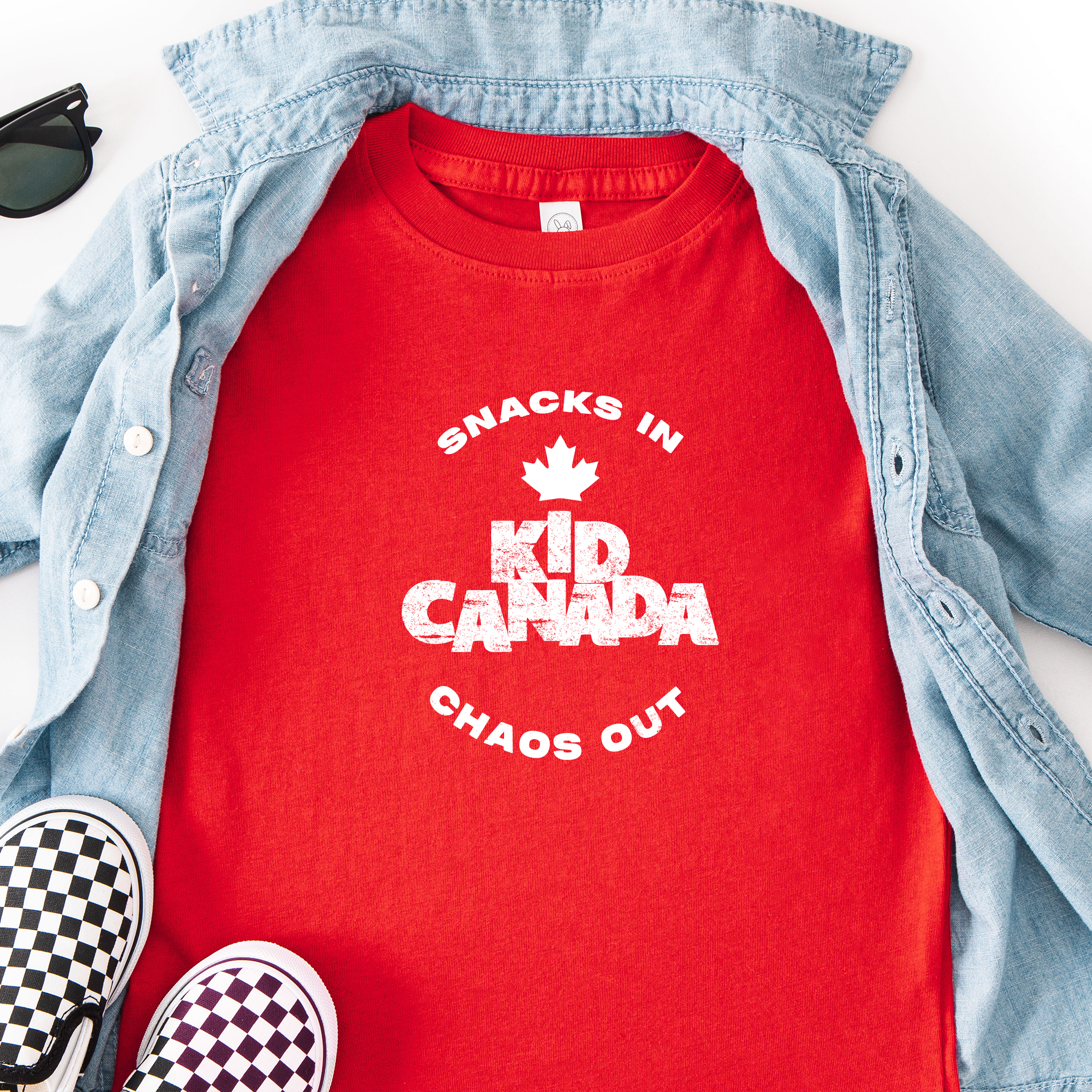 Snacks in–chaos out toddler t-shirt with 'Kid Canada' in red